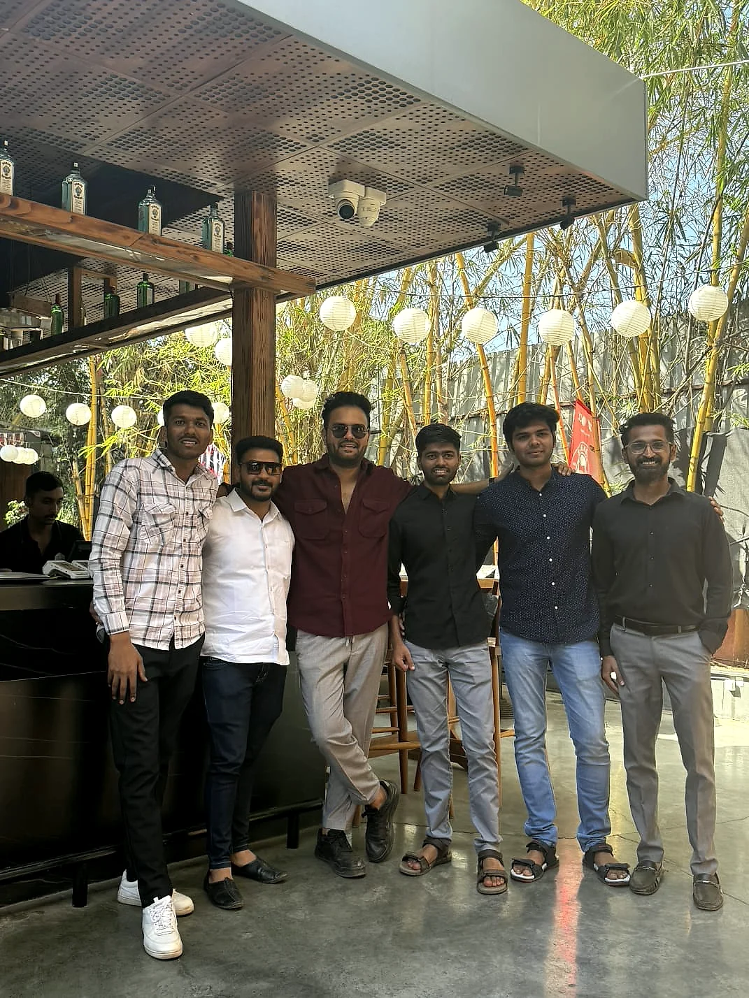 Six members of the RDA team posing arm in arm